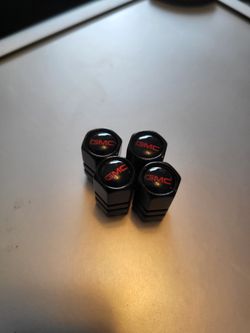 G.M.C. valve stem covers