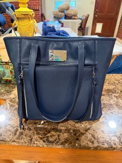 PURSE; cross streets are Arapaho & Waterview