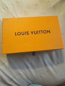  Louis Vuitton Zippy Wallet in Monogram Denim.