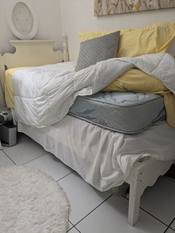 Solid wood twin platform bed.