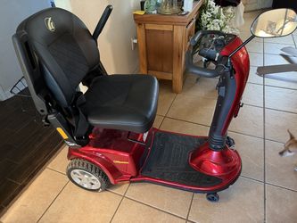Electric scooter and Harmar electric vehicle lift