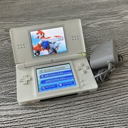 Nintendo DS with Mario Kart game, complete with stylus & charger. $50