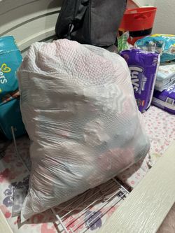 Bag of baby girl clothes