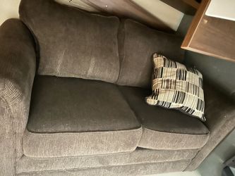 Brown Couch with fold out twin bed