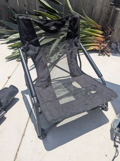 2 foldable camp or beach chairs
