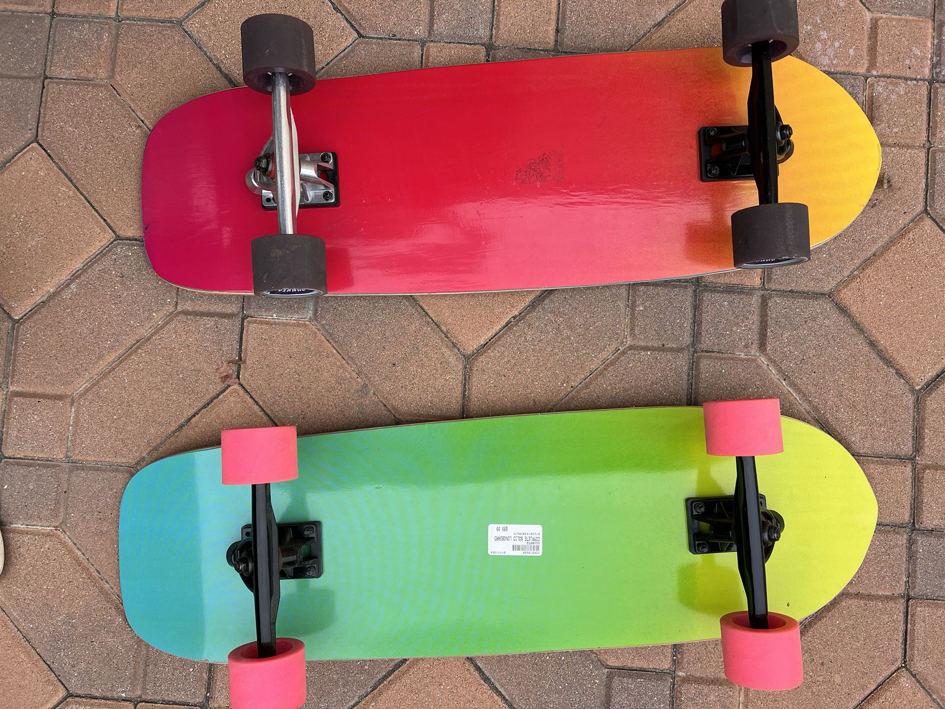 Two long board skateboards