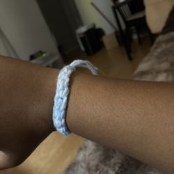 Blue and white crocheted bracelet