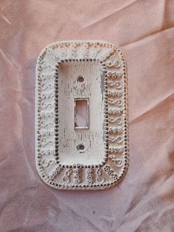 vintage 1960s light switch cover.