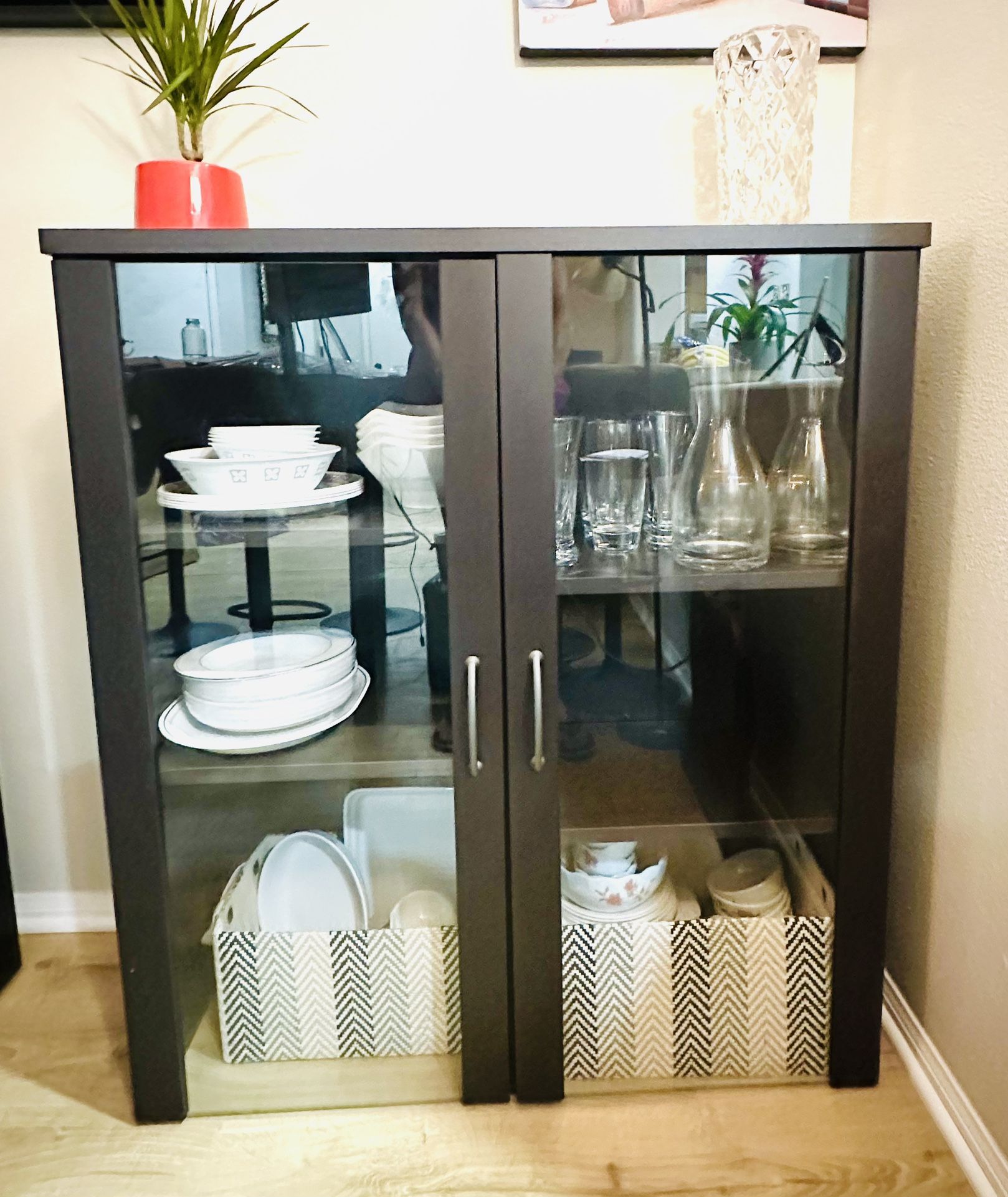 Stylish, contemporary hutch, spacious, glass doors and cabinet. Sleek. Espresso finish. $70 each or $120 for both. The cabinet measurements are width