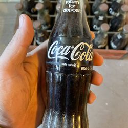 Antique Coca Cola Bottles ( Filled With Product)