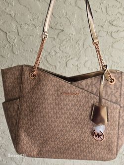 MK ROSE GOLD PURSE
