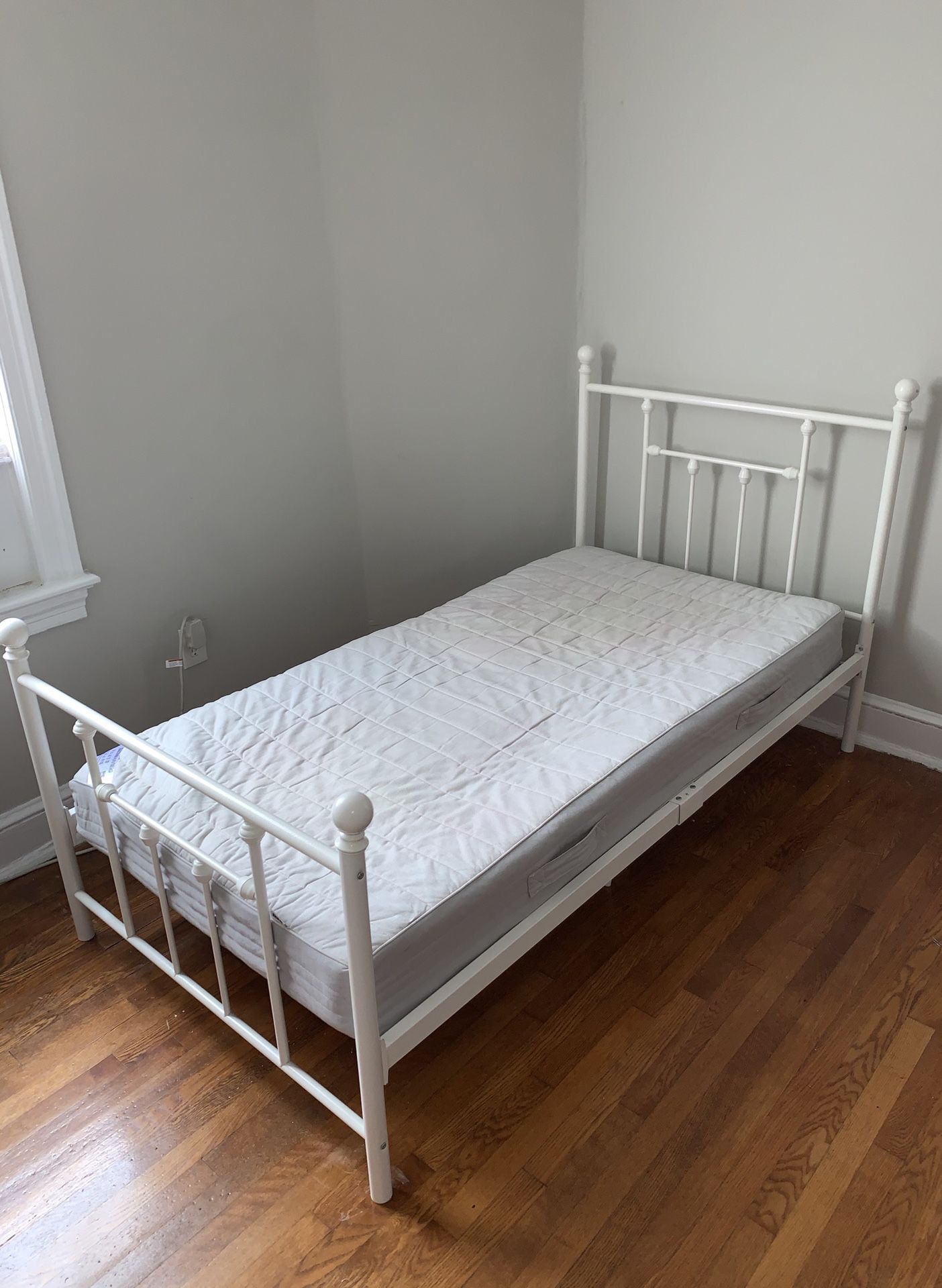 White twin size bed frame, mattress included!