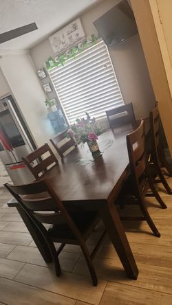 Wooden Table With Chairs
