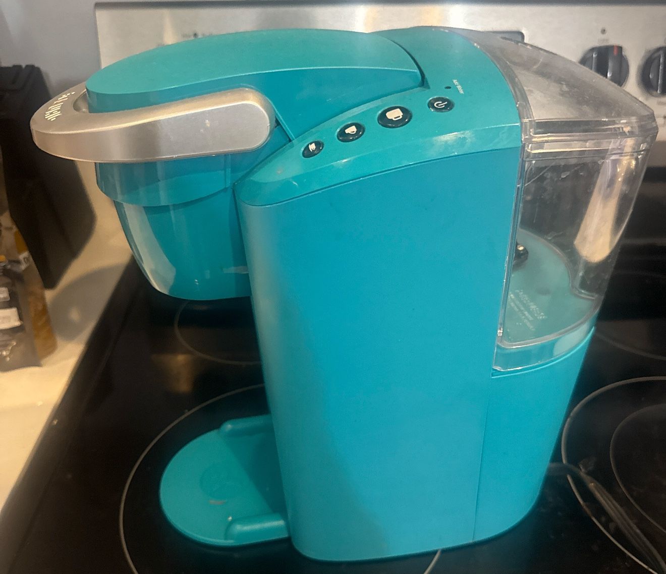 Teal Keurig single-serve coffee maker