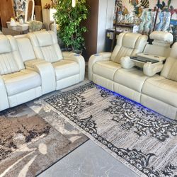 Like New Leather Electric Dual Reclining Couch And Loveseat With Electric Headrests And Dual USB And Led Lighting 
