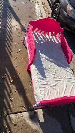 Pink Plastic Toddler Bed with Mattress