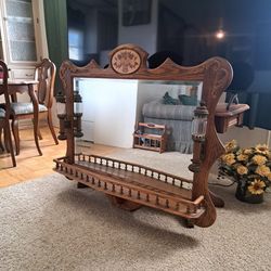 Vintage Oak With Beveled Glass Mirror  With  Solid Brass Railroad Carriage Scones . Great Condition.