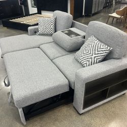 New Couch W Pullout Sleeper/Chaise Storage.  Grey Fabric.  93x61x38H(Seat Ht 18”H).  Free Delivery!