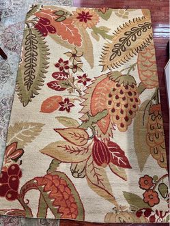 Beautiful Pottery Barn rug, 5' x 8', 100% wool and hand-tufted.