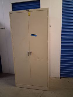 Solid metal storage cabinet with key $220 each