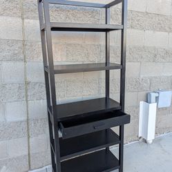 Black hardwood tiered shelf tower