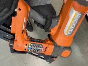 Rigid brushless nail gun RIDGID 18V Brushless Cordless framing nailer, likely the 21-degree