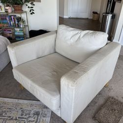 beige arm chair