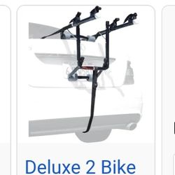 Trunk bike carrier holds 2 bike brand new $55

Hablo Español