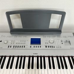 Yamaha DGX-640 88-Key Weighted Keyboard  Portable Grand Piano with Stand, Sustain Pedal, and Headphones