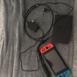 Nintendo Switch Console with Red and Blue Joy-Con