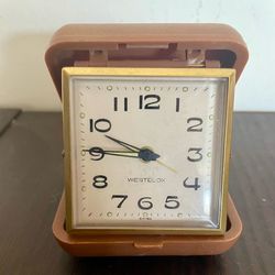 Vintage Handheld Clock ⏰