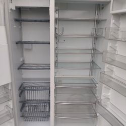 Thermador brand 48-inch wide refrigerator has an ice compartment and a water compartment.