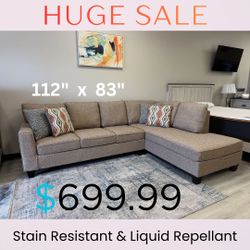 Couch with Chaise and 4 Pillows