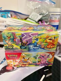 Prismatic evolution mini tins display EMPTY