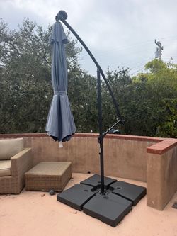 Blue Outdoor Solar Light Umbrella with Base Stand will deliver for $40