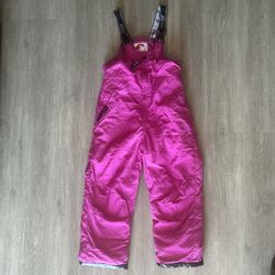 Pink children’s snow bib