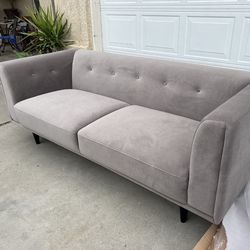 Brand new. Mid-century modern sofa. Taupe/silver velvet fabric. Retails over $1300