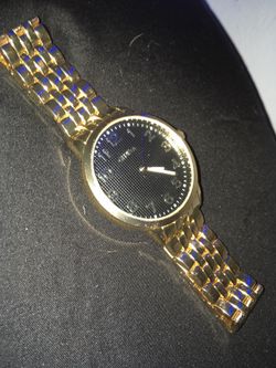 Gold watch (authenticated)