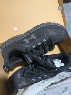 New under armour for man charged assert 9 camo size 9