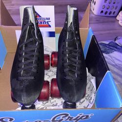SUREGRIP black suede roller skates  
