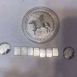 2022 Pegasus round including seven individual 1 g bars and 21 g rounds