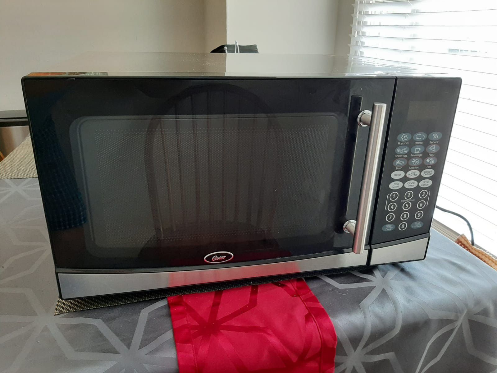 Microwave Oster 1100 watts