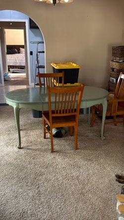 Solid wood dining room table and four solid wood chairs