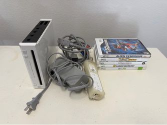 Nintendo Wii with five games controller cords