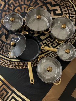 Set of six pots and pans with lids brand new