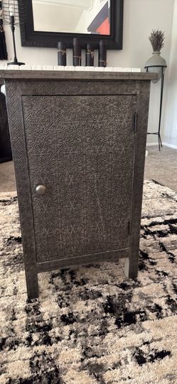 Elegant Embossed Silver Cabinet