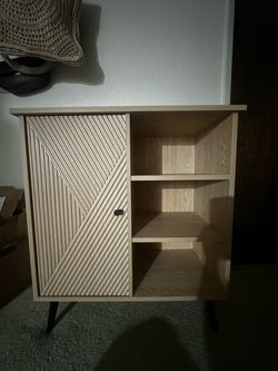 Wood Cabinet with Shelves and Textured Door