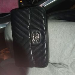  Chanel Classic Flap bag with a chain strap. 