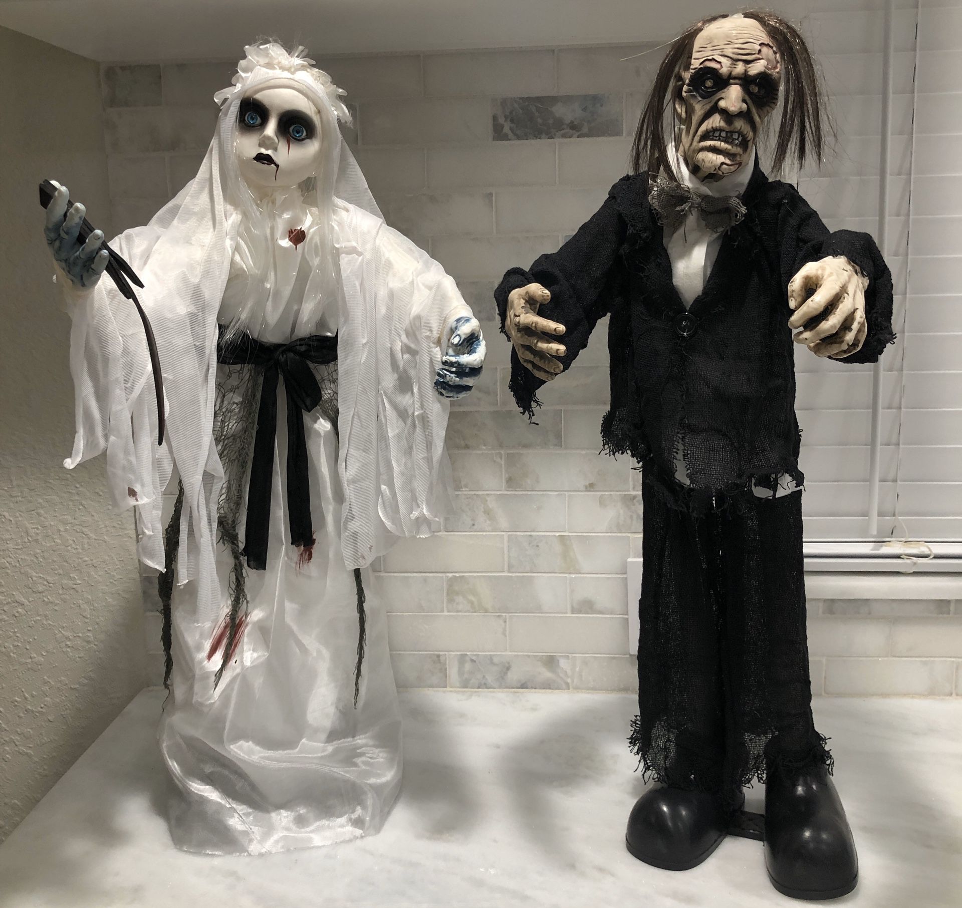 Animated bride and groom Halloween props