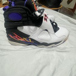 A pair Of Jordan 8 Retro 3 Peat And Jordan 8 Retro Aqua